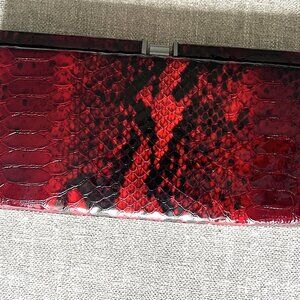 The Danier Leather Red and Black Crocodile Print Clutch Purse with Chain Strap